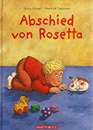 Buchcover: Abschied von Rosetta. Ein kleiner Junge spielt mit seinem Haustier auf dem Teppich.